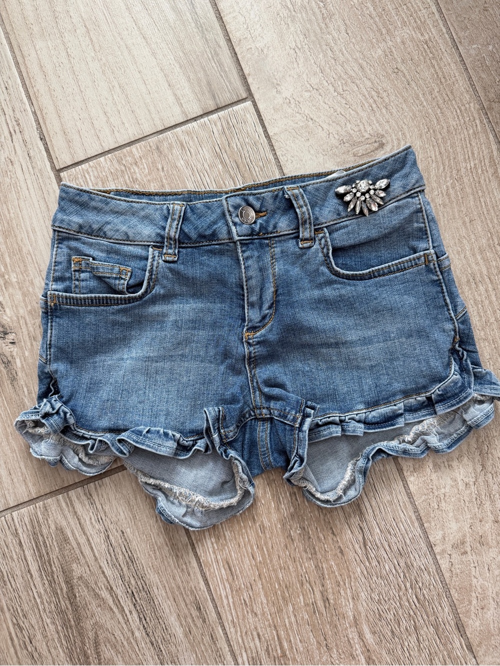 Liu Jo Light Blue Ruffled Hem Denim Shorts with Rhinestone Accent